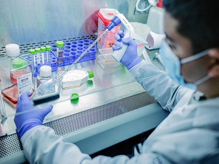 Scientists doing research in lab