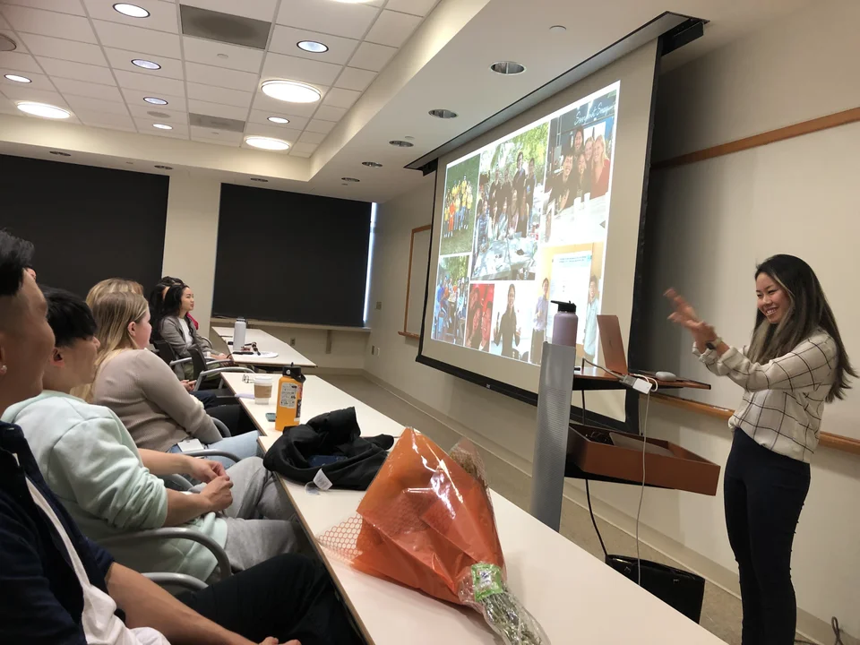 Lab member giving presentation to audience