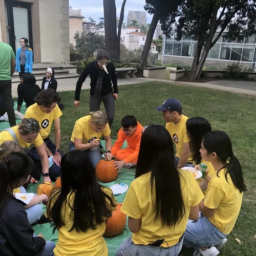 Group making a jack-o-lantern