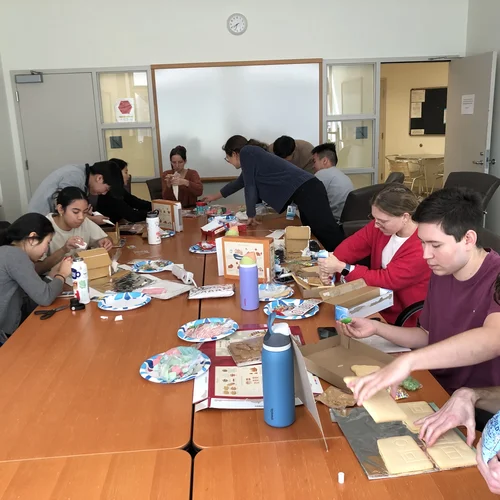 Lab members making gingerbread houses